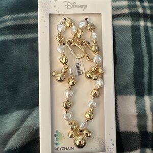 NWT DISNEY GOLD AND PEARL ICON BAG CHARM